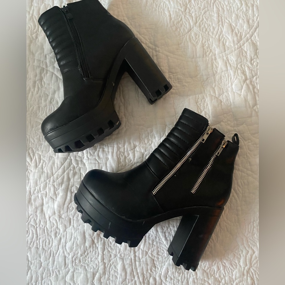 Chunky black ankle booties with heel and zippers, size 8. Very lightly worn.